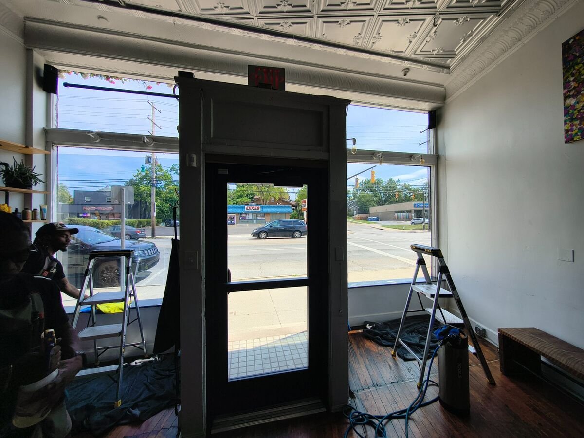 Commercial window tint install in progress